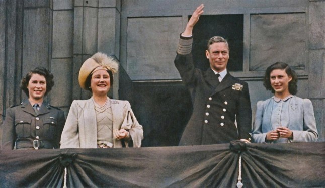 'The King and Queen with Princess Elizabeth and Princess Margaret on the Balcony of Buckingham Palace on VE-Day', 8 May 1945. King George VIand Queen Elizabeth with daughters Princess Elizabeth (future Queen Elizabeth II) and Princess Margaret Rose, celebrating the end of the Second World War. Raphael Tuck & Sons Ltd., London, 1945] (Colorised black and white print). Creator: Daily Herald. (Photo by The Print Collector/Heritage Images via Getty Images)
