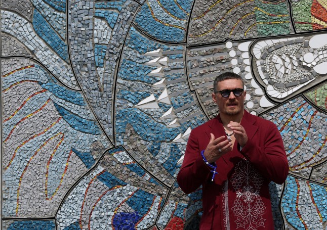 Boxing Heavyweight Champion Oleksandr Usyk launches a fundraiser for the rebuilding of apartment buildings in Ukraine. Images via Reuters/John Sibley TPX IMAGES OF THE DAY
